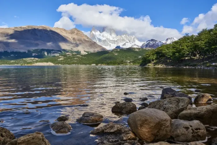 Framed Print : Wide angle shot of Capri Lagoon featuring Monte Fitz Roy in the background and rocks Framed Print : Wide angle shot of Capri Lagoon featuring Monte Fitz Roy in the background and rocks