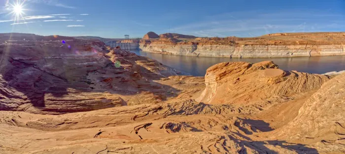 Framed Print : Wide angle view of Glen Canyon Dam from the wavy sandstone mesa of an area called Framed Print : Wide angle view of Glen Canyon Dam from the wavy sandstone mesa of an area called