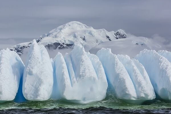 Wind and water sculpted iceberg in Orne Harbor, Antarctica, Polar Regions