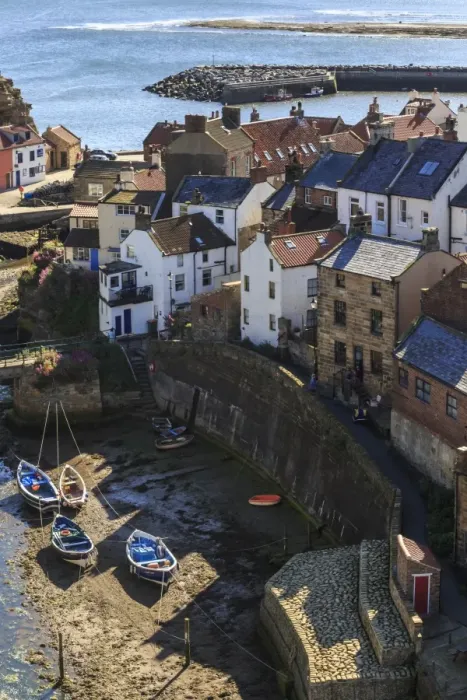 Framed Print : Winding alleys of village, fishing boats and sea, elevated view in summer, Staithes Framed Print : Winding alleys of village, fishing boats and sea, elevated view in summer, Staithes