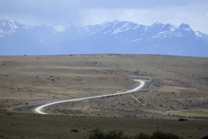 Framed Print : Winding desert road and Andes mountains, El Calafate, Parque Nacional Los Glaciares Framed Print : Winding desert road and Andes mountains, El Calafate, Parque Nacional Los Glaciares