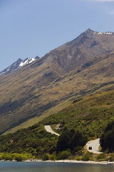 A winding mountain road on the edge of Lake Wakatipu near Queenstown