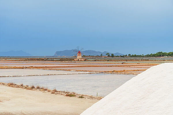 Windmill with pile of salt in the salt flats, Saline Ettore e Infersa, Marsala, province of Trapani, Sicily, Italy, Mediterranean, Europe