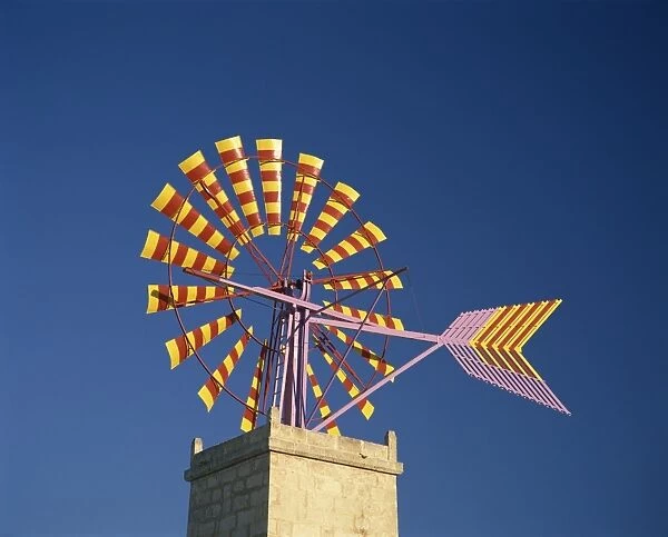 Windmill with sails in the colours of the Mallorcan flag