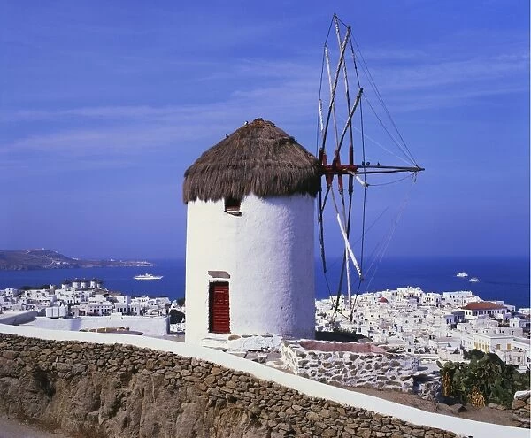 Windmill and View of Mykonos by the Coast, Cyclades, Greece