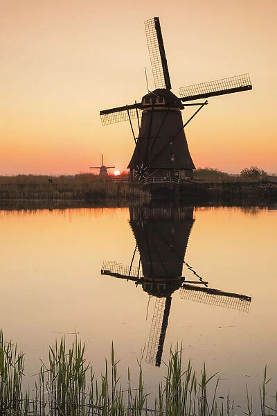 Windmills at sunset, Kinderdijk, UNESCO World Heritage Site, South Holland, Netherlands
