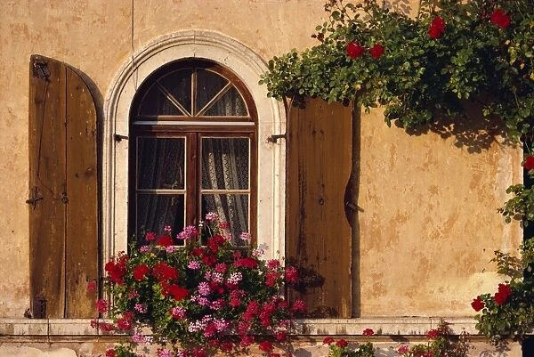Window with shutters and window box