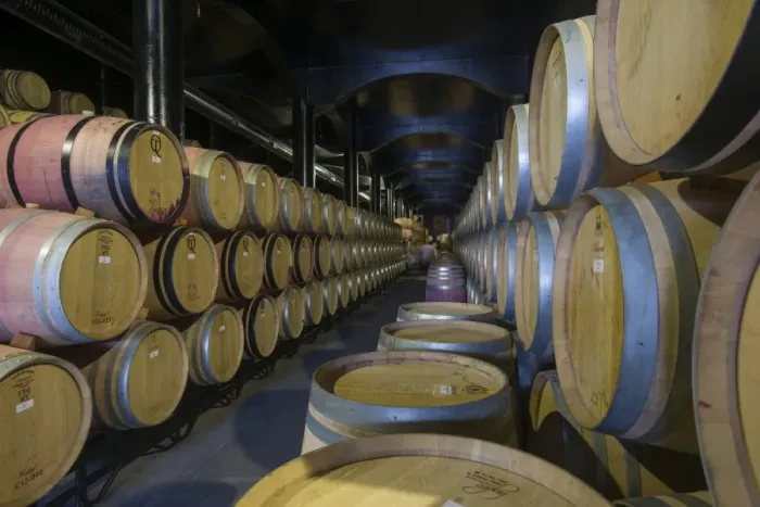 Framed Print : Wine ageing in oak barrels in a cellar at a winery in the Alto Douro region of Portugal Framed Print : Wine ageing in oak barrels in a cellar at a winery in the Alto Douro region of Portugal