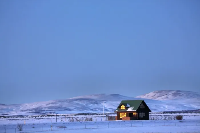 Framed Print : Winter landscape at dusk showing lone cabin bathed in evening sunlight, near Seljalandsfoss Framed Print : Winter landscape at dusk showing lone cabin bathed in evening sunlight, near Seljalandsfoss