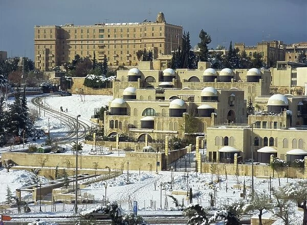 Winter snow covers buildings in Davids Village and the King David Hotel in Jerusalem