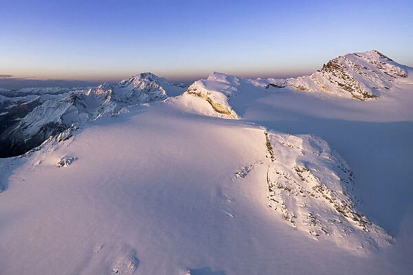 Winter sunrise on snowcapped Monte Disgrazia, Sassa Entova