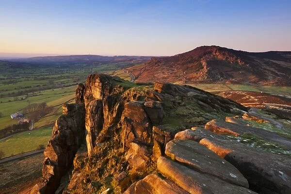 Winter sunset on the gritstone rock formations of Hen Cloud in the Roaches, Staffordshire, England, United Kingdom, Europe