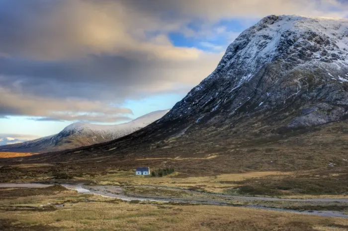 Framed Print : Winter view of Rannoch Moor showing lone whitewashed cottage on the bank of a river Framed Print : Winter view of Rannoch Moor showing lone whitewashed cottage on the bank of a river
