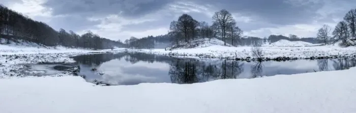 Framed Print : Winter view of River Brathay at dawn, under snow with reflections, near Elterwater Village Framed Print : Winter view of River Brathay at dawn, under snow with reflections, near Elterwater Village