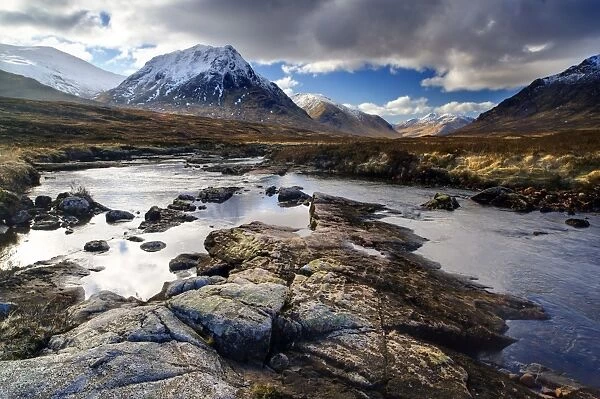 Winter view over River Etive towards snow-capped mountains, Rannoch Moor