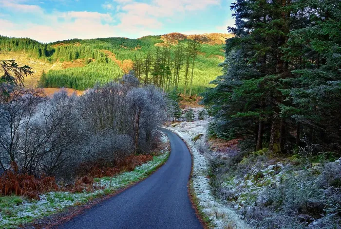 Framed Print : A winter view of a winding road through a wooded valley in the Ardnamurchan Peninsula Framed Print : A winter view of a winding road through a wooded valley in the Ardnamurchan Peninsula