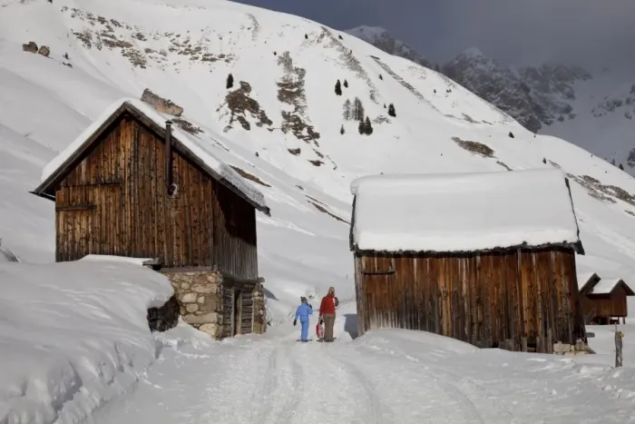 Framed Print : Winter walk on snowy path through wooden barns around San Pellegrino Pass Framed Print : Winter walk on snowy path through wooden barns around San Pellegrino Pass