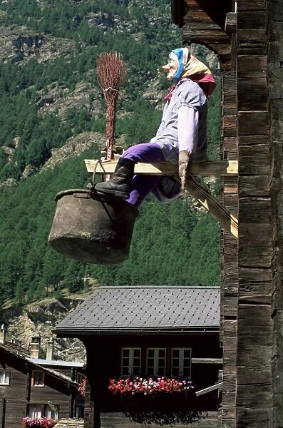 Witch hanging outside village house