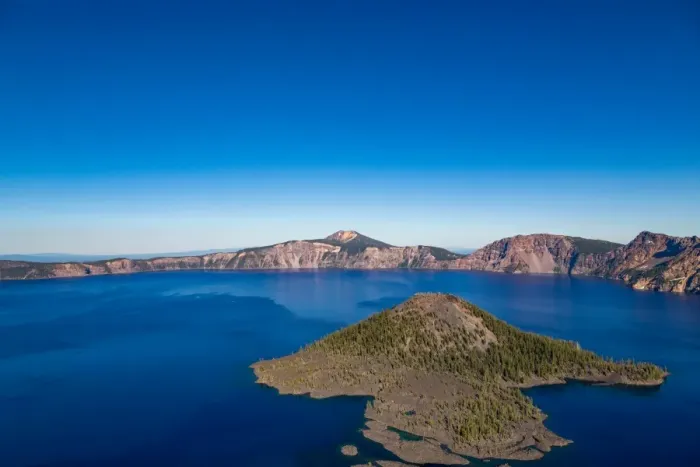 Framed Print : Wizard Island and the still waters of Crater Lake, the deepest lake in the U. S. A Framed Print : Wizard Island and the still waters of Crater Lake, the deepest lake in the U. S. A