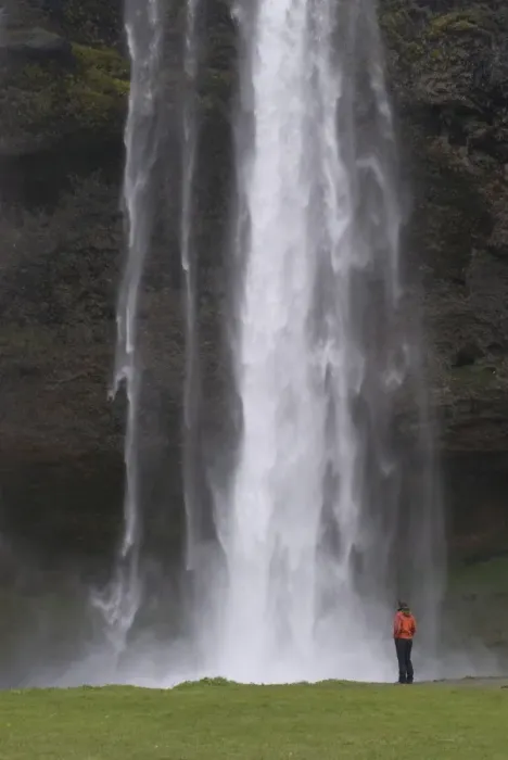 Framed Print : Woman admiring the big waterfall of Seljandsfoss, Iceland, Polar Regions Framed Print : Woman admiring the big waterfall of Seljandsfoss, Iceland, Polar Regions