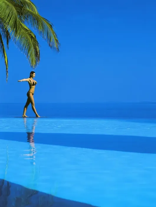 Framed Print : Woman balancing on edge of infinity pool, Maldives, Indian Ocean, Asia Framed Print : Woman balancing on edge of infinity pool, Maldives, Indian Ocean, Asia