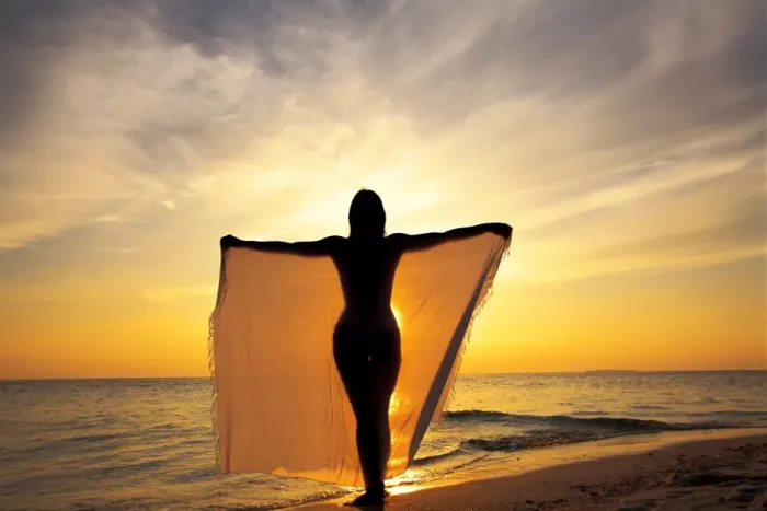 Framed Print : Woman on a beach at sunset, Maldives, Indian Ocean, Asia Framed Print : Woman on a beach at sunset, Maldives, Indian Ocean, Asia