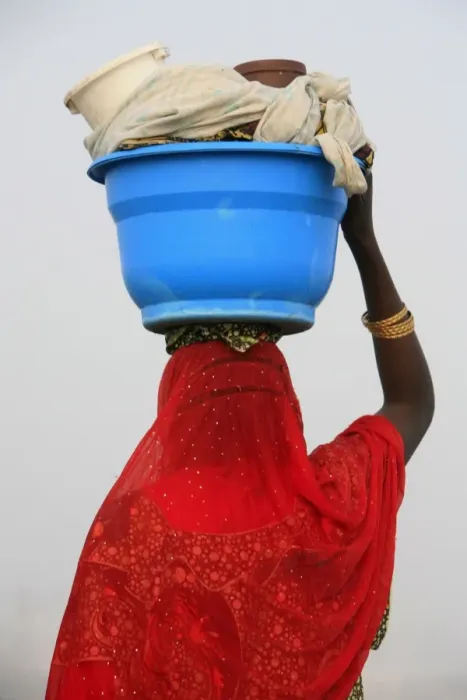 Framed Print : Woman carrying a bowl on her head, Saint Louis, Senegal, West Africa, Africa Framed Print : Woman carrying a bowl on her head, Saint Louis, Senegal, West Africa, Africa