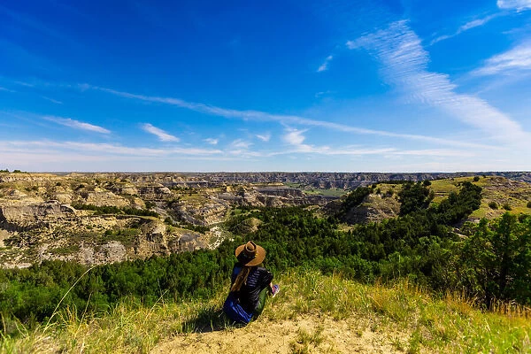 Woman enjoying the view along the Theodore Roosevelt National Park North Unit