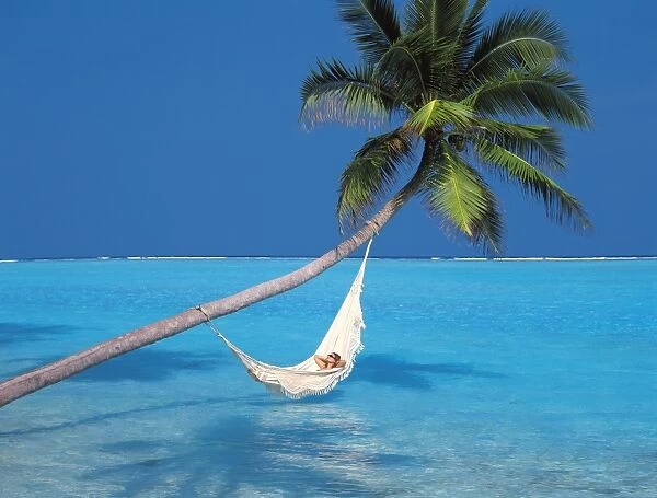 Woman in hammock, South Male Atoll, Maldives, Indian Ocean, Asia