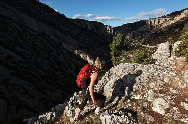 Woman hiking in the Mascun Gorge, one of Europes most popular canyoning destinations