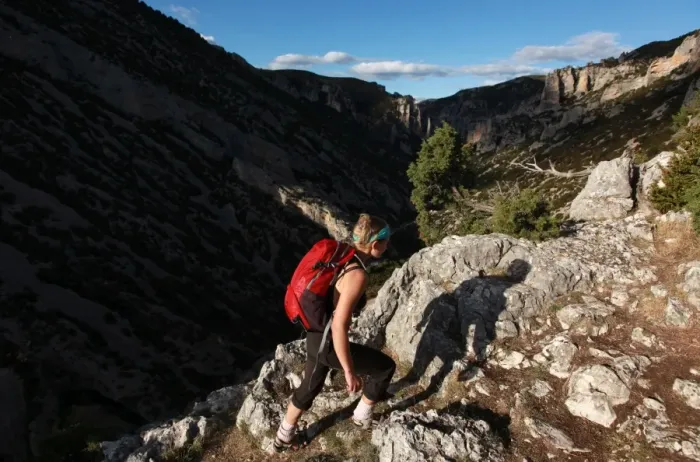 Framed Print : Woman hiking in the Mascun Gorge, one of Europes most popular canyoning destinations Framed Print : Woman hiking in the Mascun Gorge, one of Europes most popular canyoning destinations