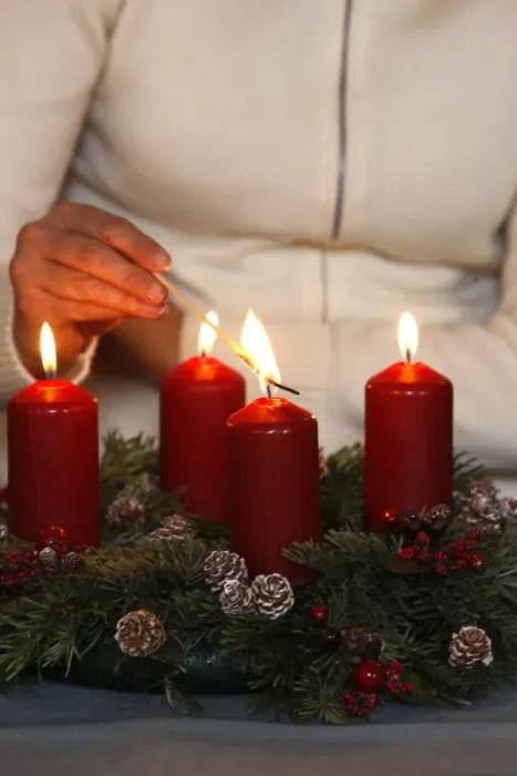 Framed Print : Woman lighting advent candles, Saint Nicolas de Veroce, Haute Savoie, France, Europe Framed Print : Woman lighting advent candles, Saint Nicolas de Veroce, Haute Savoie, France, Europe