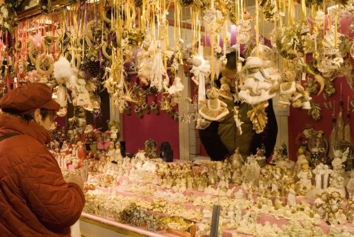Framed Print : Woman looking at Christmas decorations at stall, Christkindlmarkt (Christmas Market) at Rathausplatz, Innere Stadt, Vienna Framed Print : Woman looking at Christmas decorations at stall, Christkindlmarkt (Christmas Market) at Rathausplatz, Innere Stadt, Vienna