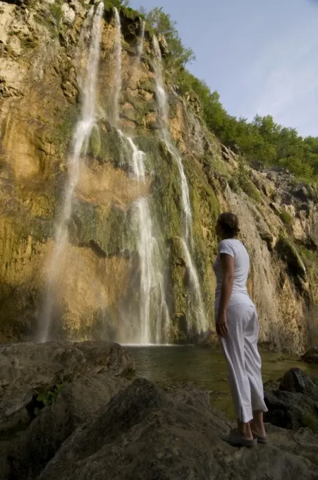 Framed Print : Woman looking at a giant waterfall, Plitvice Lakes National Park, UNESCO World Heritage Site Framed Print : Woman looking at a giant waterfall, Plitvice Lakes National Park, UNESCO World Heritage Site