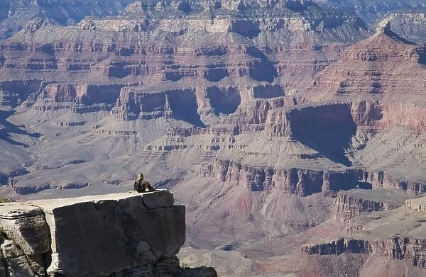 Woman looking over the Grand Canyon