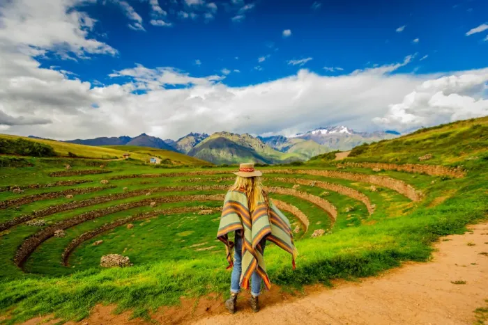 Framed Print : Woman looking out at Inca ruins, Moray, Peru, South America Framed Print : Woman looking out at Inca ruins, Moray, Peru, South America