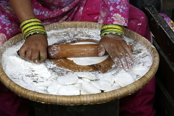 Woman making chapati, Dakshin Kali, Nepal, Asia