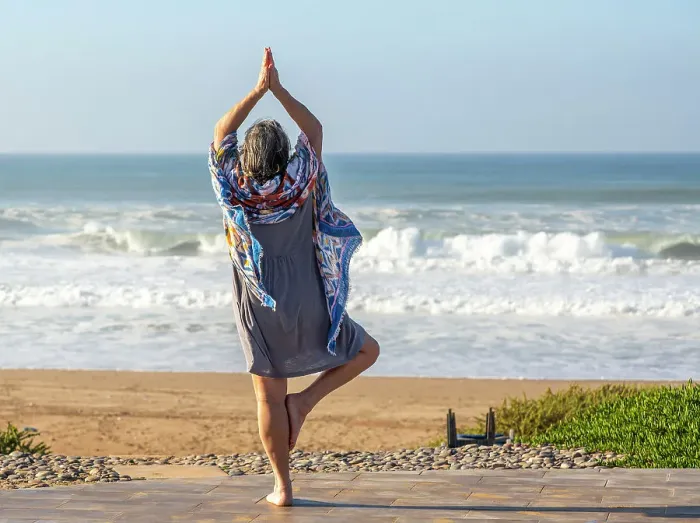 Framed Print : Woman performing yoga Tree pose, Vrikshasanayoga, Atlantic Ocean, Morocco, North Africa, Africa Framed Print : Woman performing yoga Tree pose, Vrikshasanayoga, Atlantic Ocean, Morocco, North Africa, Africa