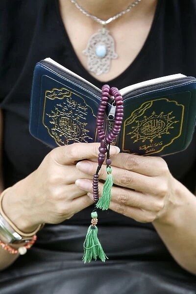 Woman reading the Koran
