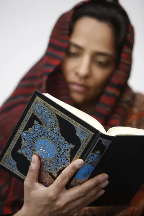 Framed Print : Woman reading Koran, Jordan, Middle East
