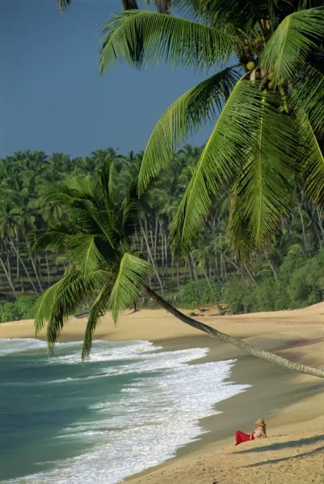 Framed Print : Woman relaxing on empty beach Framed Print : Woman relaxing on empty beach