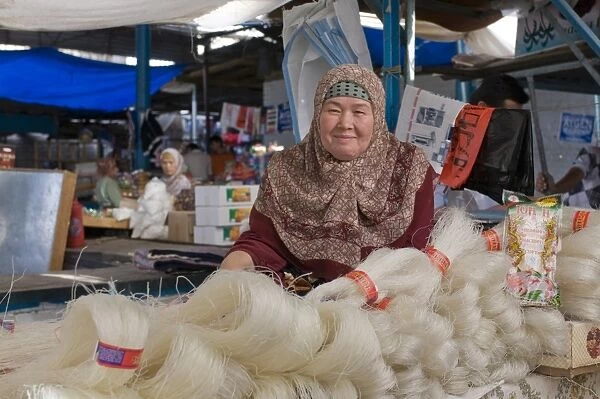Woman selling rice noodles, Osh, Kyrgyzstan, Central Asia, Asia