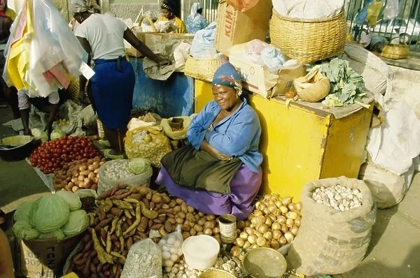 Woman selling vegetables in the city market, Praia, Santiago Island, Cape Verde Islands