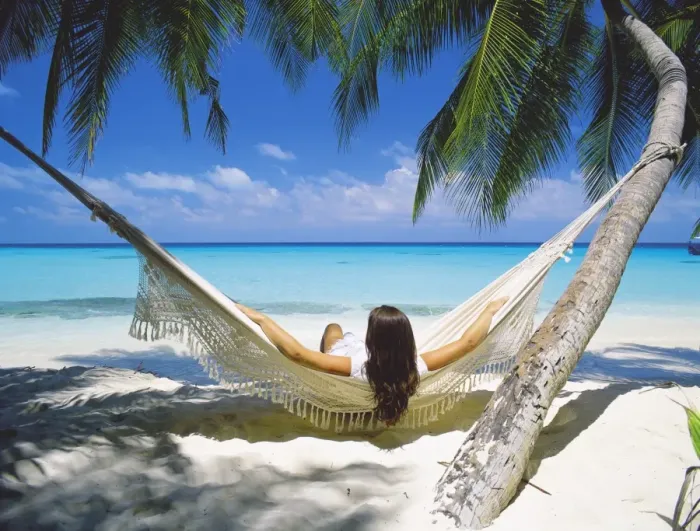 Framed Print : Woman sitting in hammock on beach, Maldives, Indian Ocean, Asia Framed Print : Woman sitting in hammock on beach, Maldives, Indian Ocean, Asia