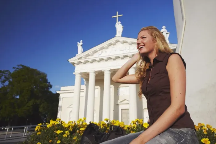 Framed Print : Woman sitting outside Vilnius Cathedral, Vilnius, Lithuania, Baltic States, Europe Framed Print : Woman sitting outside Vilnius Cathedral, Vilnius, Lithuania, Baltic States, Europe