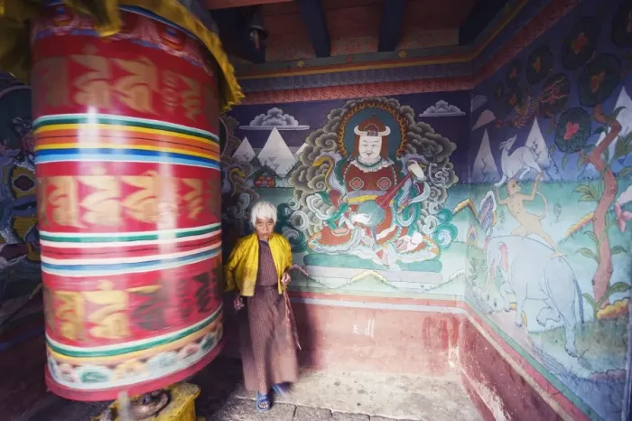 Framed Print : A woman spinning a prayer wheel, Chimi Lhakhang dating from 1499, Temple of the Divine Madman Lama Drukpa Kunley, Punakha Framed Print : A woman spinning a prayer wheel, Chimi Lhakhang dating from 1499, Temple of the Divine Madman Lama Drukpa Kunley, Punakha