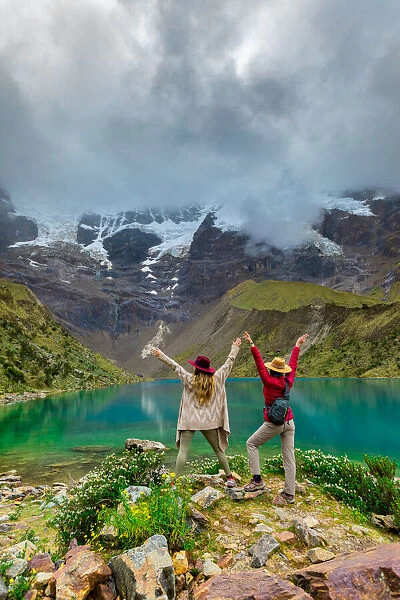 Two woman trekking Humantay Lake, Cusco, Peru, South America