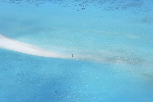 Woman walking on sandbank, Maldives, Indian Ocean, Asia