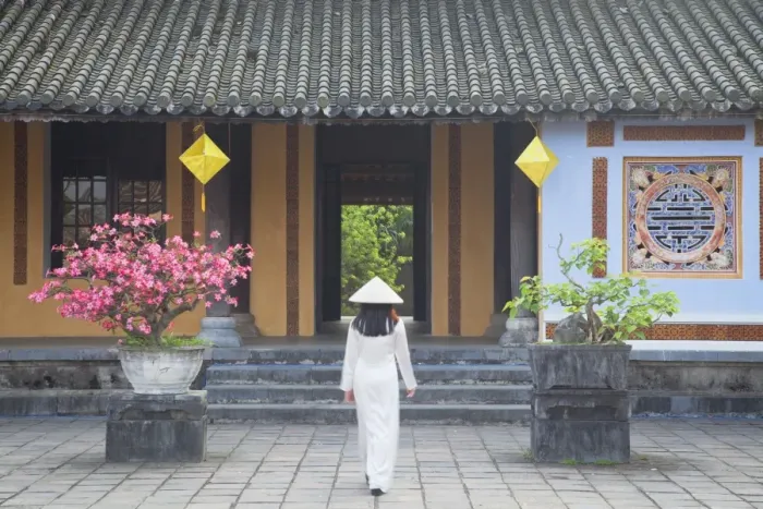 Framed Print : Woman wearing Ao Dai dress at Left House inside Citadel, Hue, Thua Thien-Hue, Vietnam, Indochina, Southeast Asia, Asia Framed Print : Woman wearing Ao Dai dress at Left House inside Citadel, Hue, Thua Thien-Hue, Vietnam, Indochina, Southeast Asia, Asia