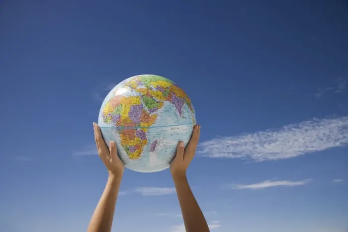 Framed Print : Womans hands holding globe Framed Print : Womans hands holding globe